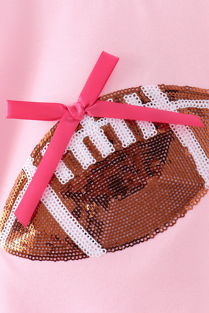 Pink football bow sequin bubble