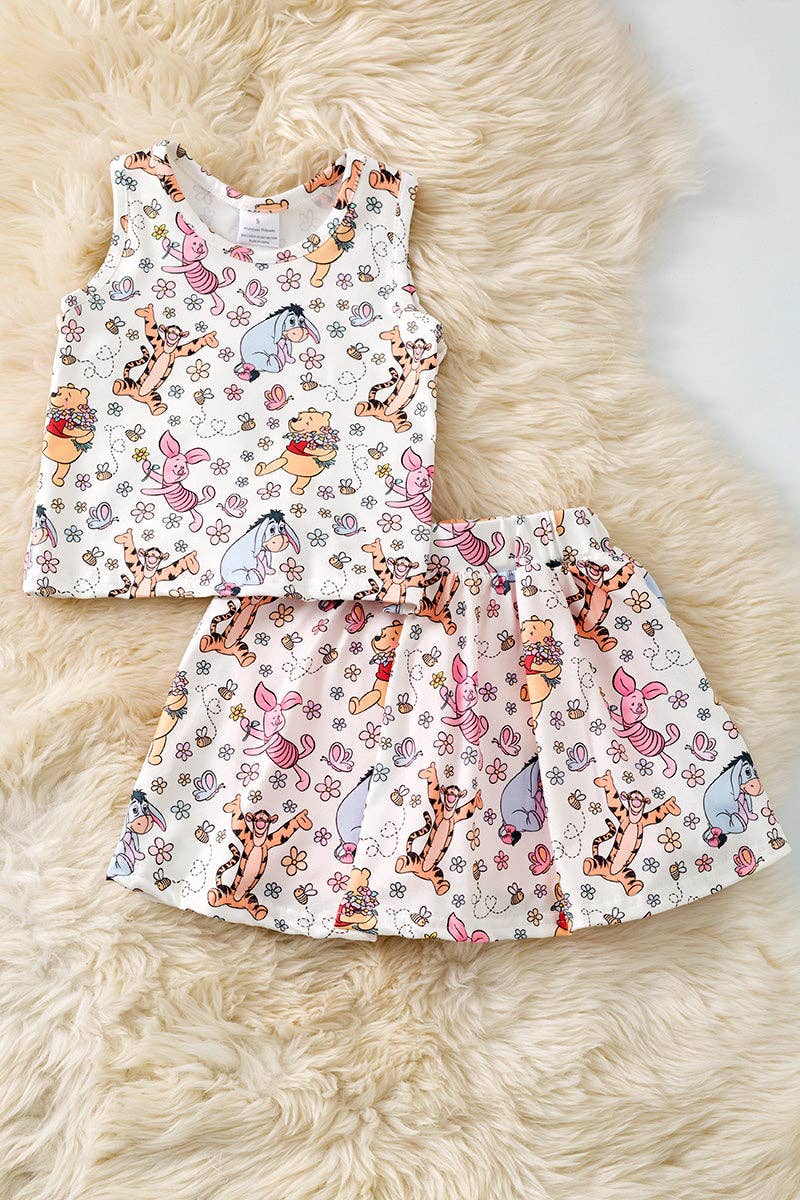 Character printed top & skort. OFG52573 AMY