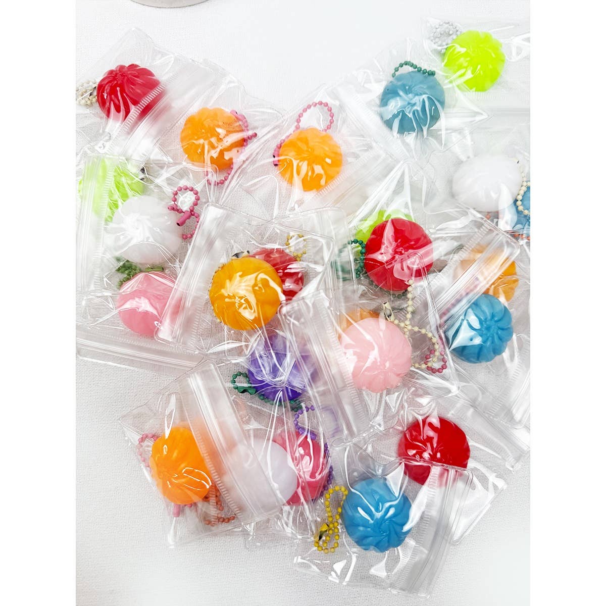 24 pcs Mini Dumpling Squishy with Key Ring Toy Box