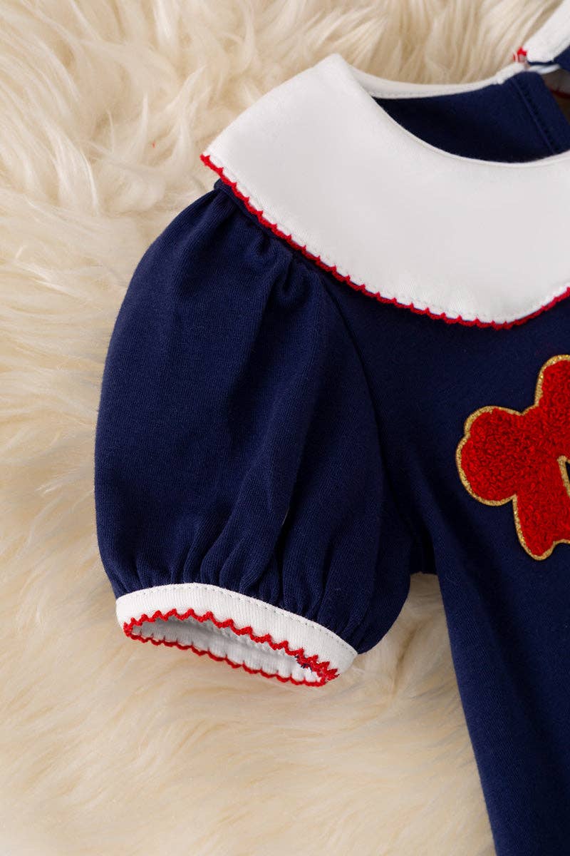 Bow applique on navy blue dress. DRG60697 Jean